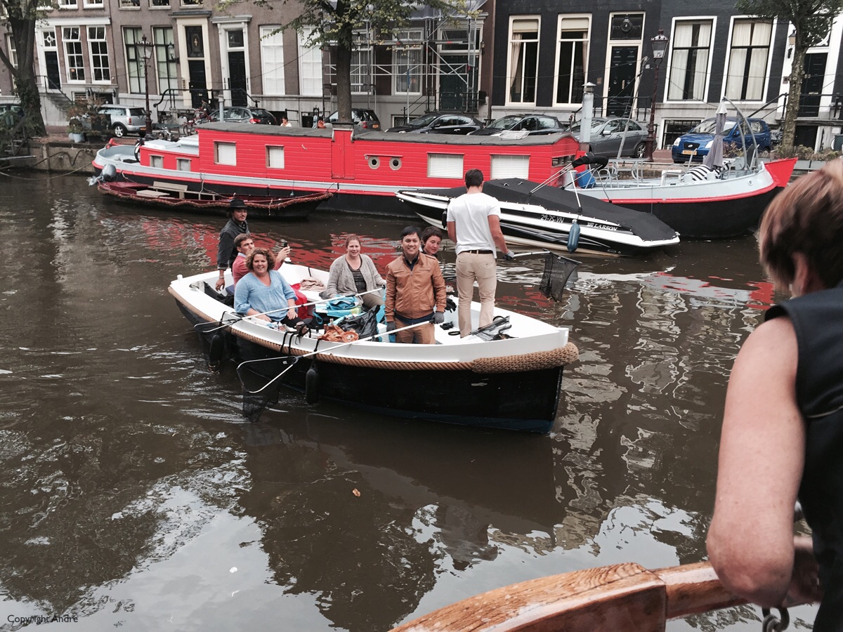 Picking up trash in the canals.